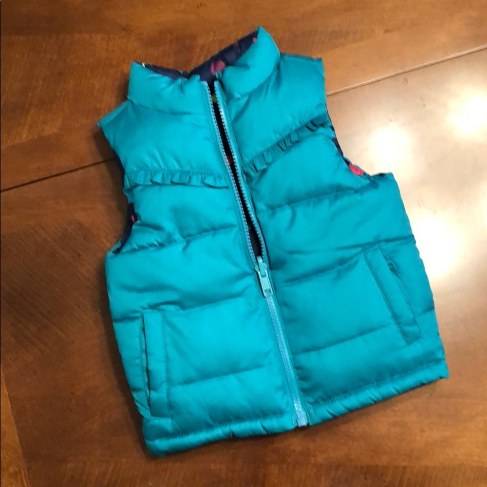 Toddler vest, Reversible. Guessing it’s a 2T.